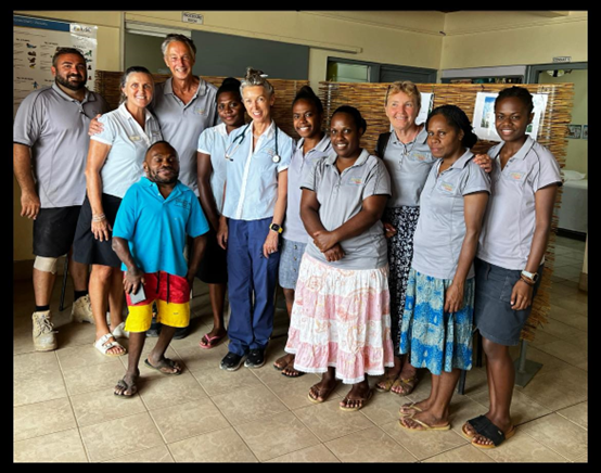 2023 Madalyn and staff of Medical Santo